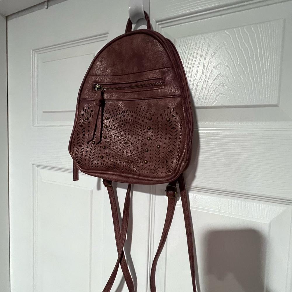 Purple mini backpack with adjustable straps